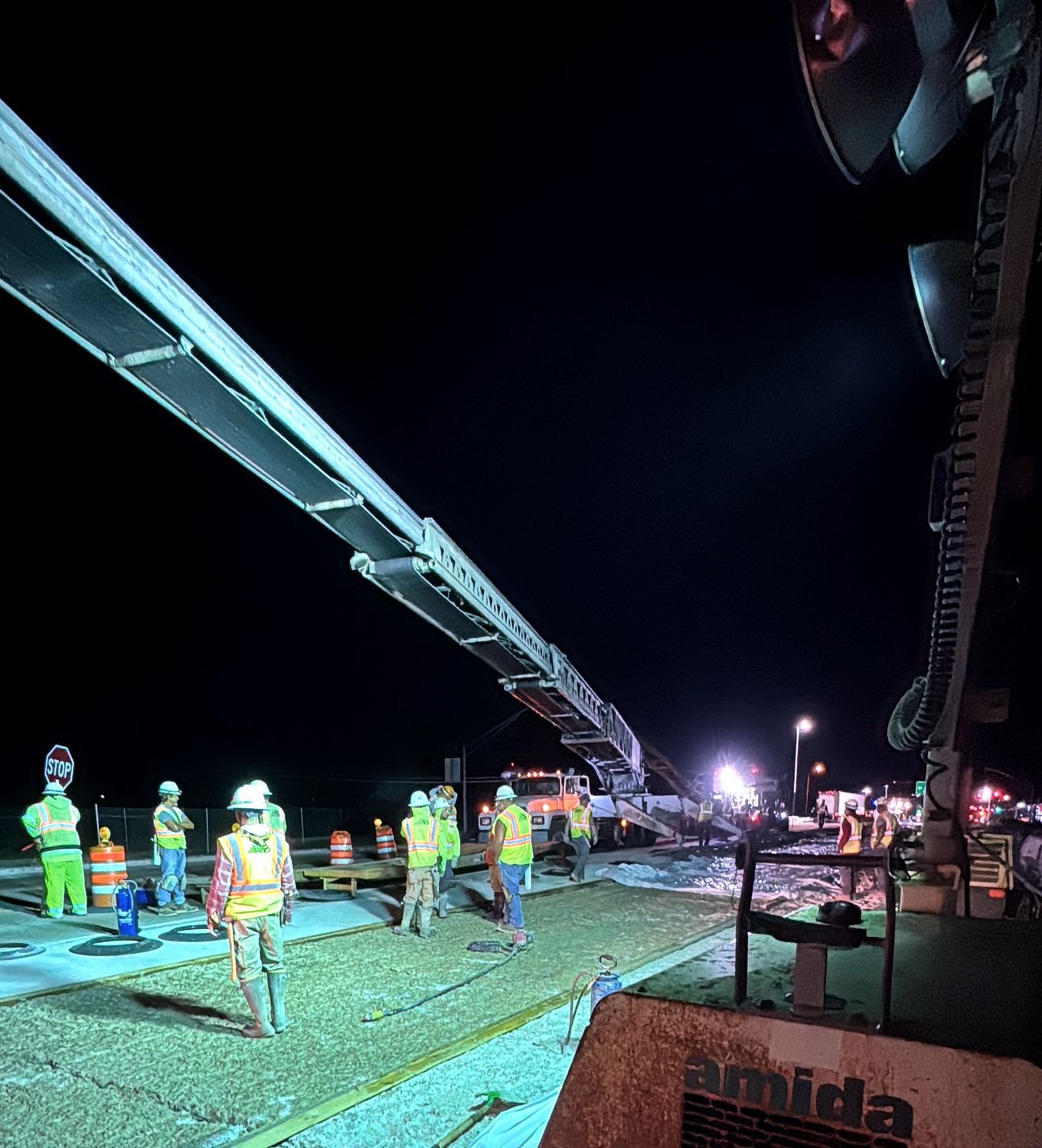 Night paving operations on the bridge deck